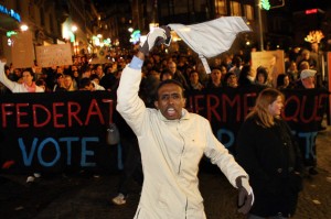 Demonstrators protest after Swiss voters approved a ban on minarets, December 2009. AP Images. COPYRIGHT 2014 Gale, Cengage Learning