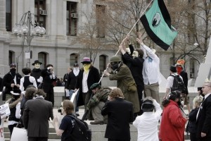 Operation Reconnect protesters hide their identities using masks, because of fear from reprisals by Scientologists, during a demonstration on Sunday, April 13, 2008. Akira Suma/McClatchy-Tribune Photos 2010